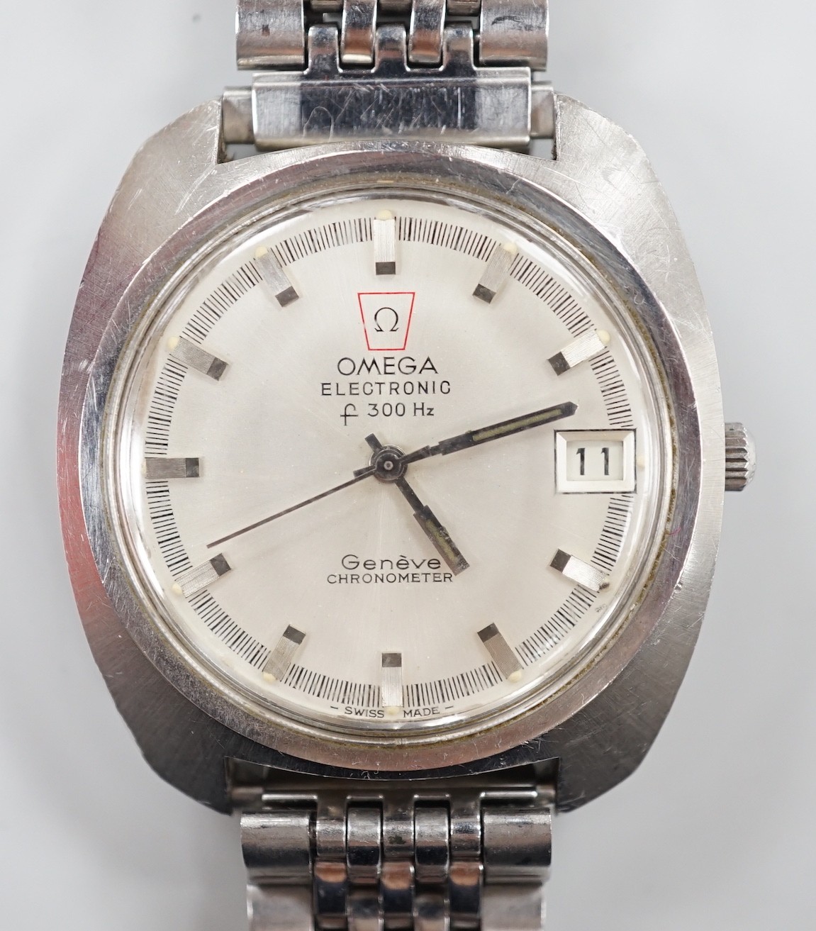 A gentleman's 1970's? stainless steel Omega Electronic wrist watch, on associated steel bracelet, a case diameter 38mm, box no papers.